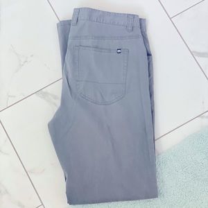 TravisMathew Jet five pocket pant. Color gray castlerock.  Size 34/32.
